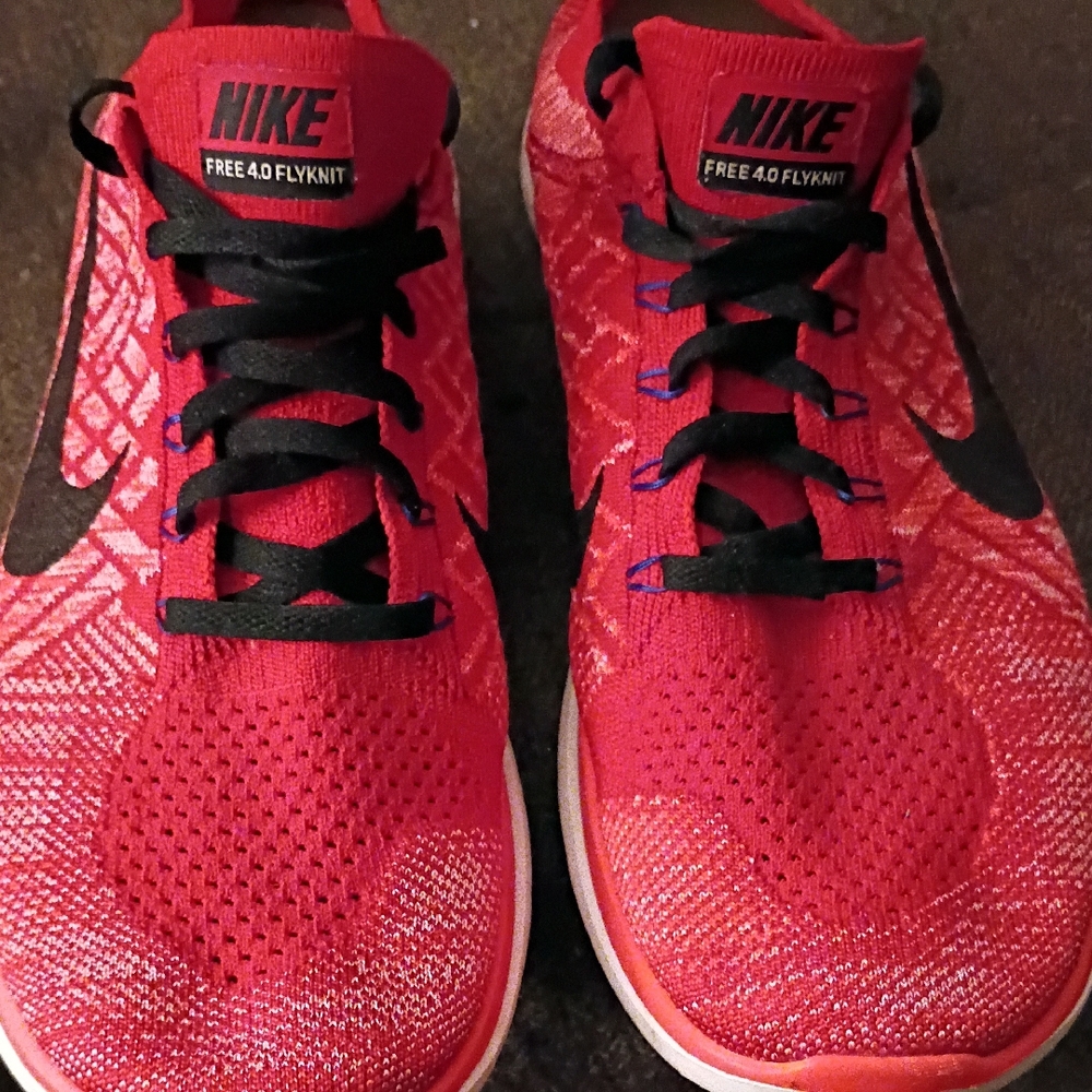 Nike Orange and Black Flyknit Athletic Shoes